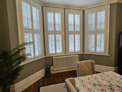 Café style shutters providing privacy in a ground floor room