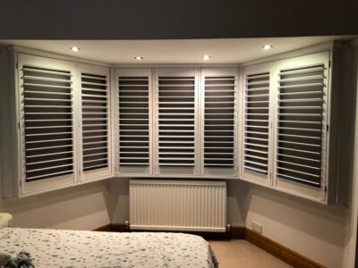 Venetian blinds fitted in a kitchen window by JV Blinds
