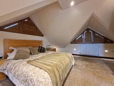 Plantation shutters on French doors installed by JV Blinds