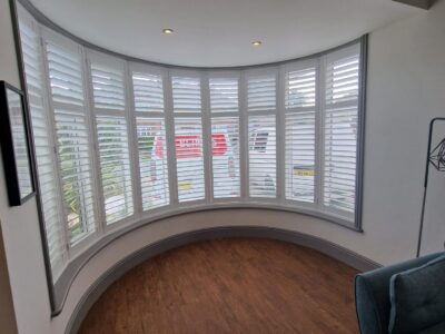 Full height shutters on a sash window installed by JV Blinds